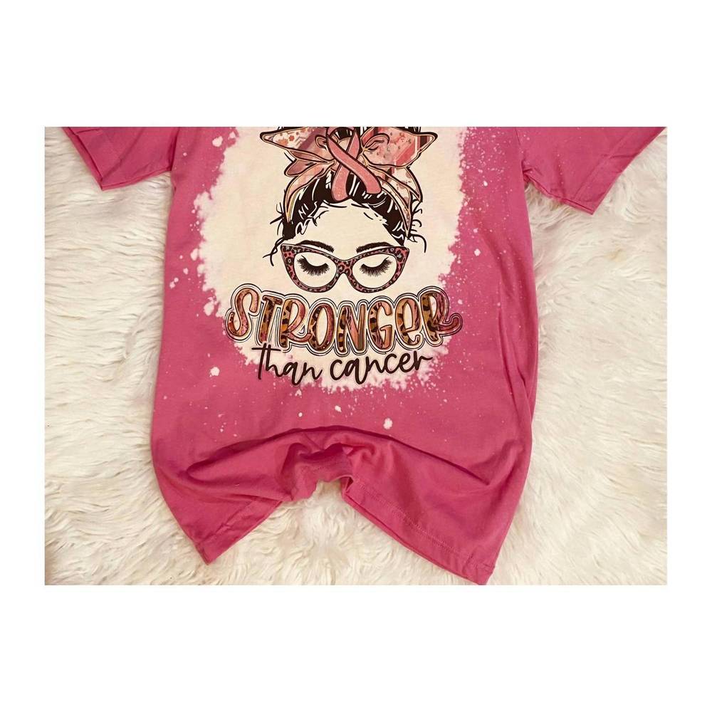 NEW SQUISHY FACES women's stronger than cancer bleached tee in pink